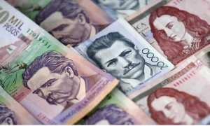Derecho a percibir Auxilio de Transporte cuando el salario devengado excede los dos salarios mínimos a causa de trabajo suplementario u horas extras